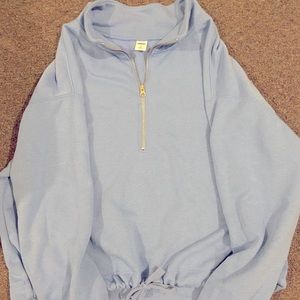 Blue crop half zip pull over.